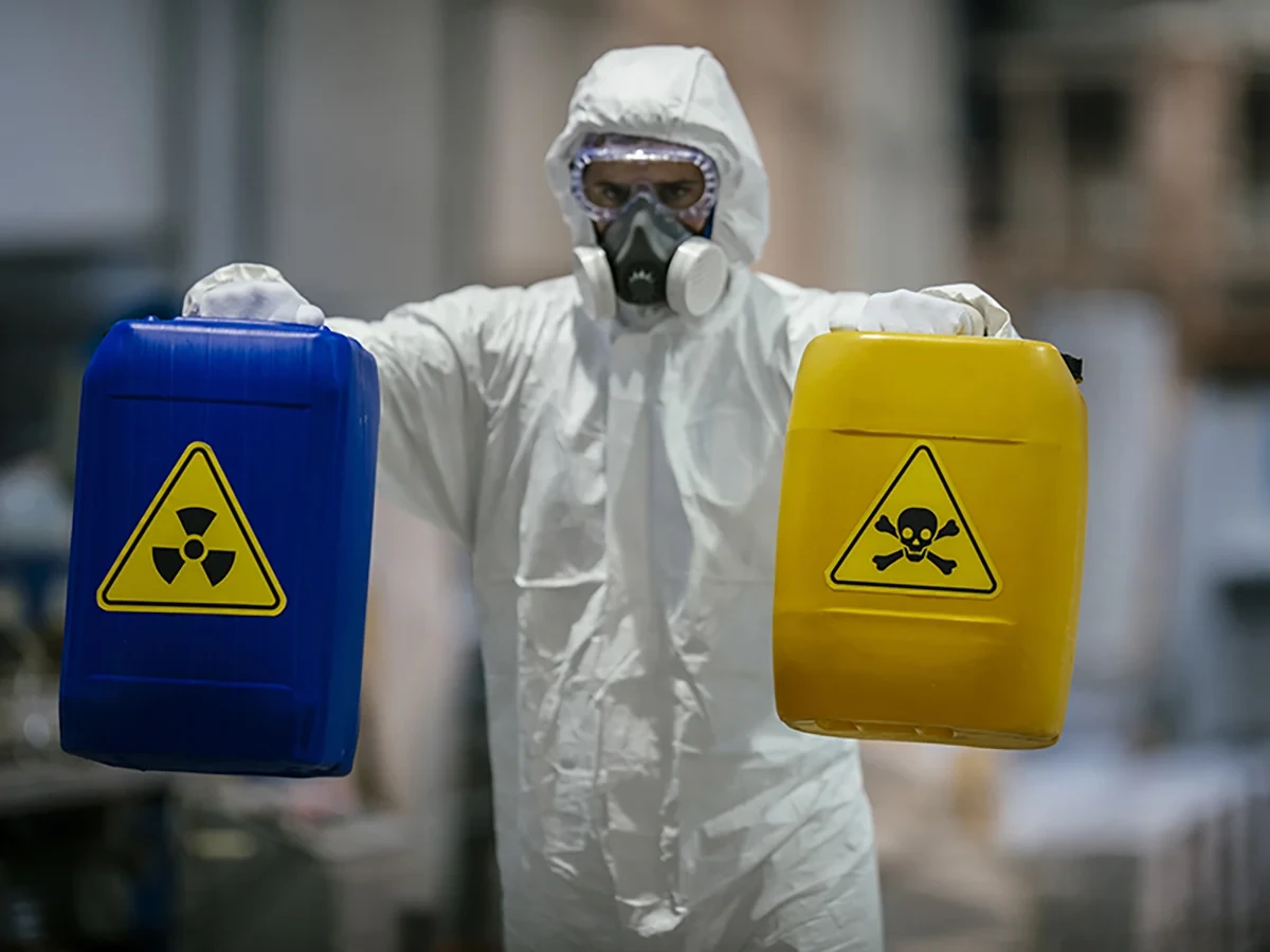 Biohazard cleanup technicians in protective equipment at a remediation scene in Springfield, TN